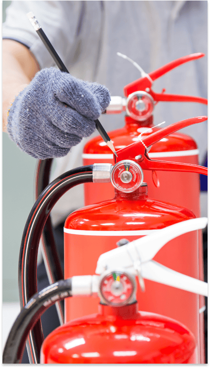 fire-engineering-checking-pressure-gauge-level-fire-extinguisher (1)